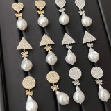 Pave earring with glass pearl pendant
