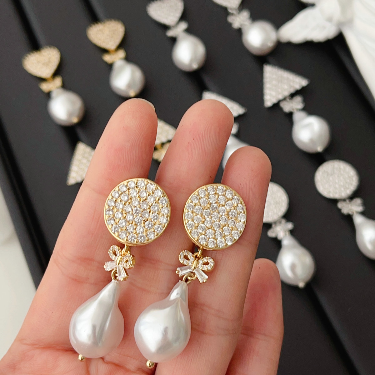 Pave earring with glass pearl pendant