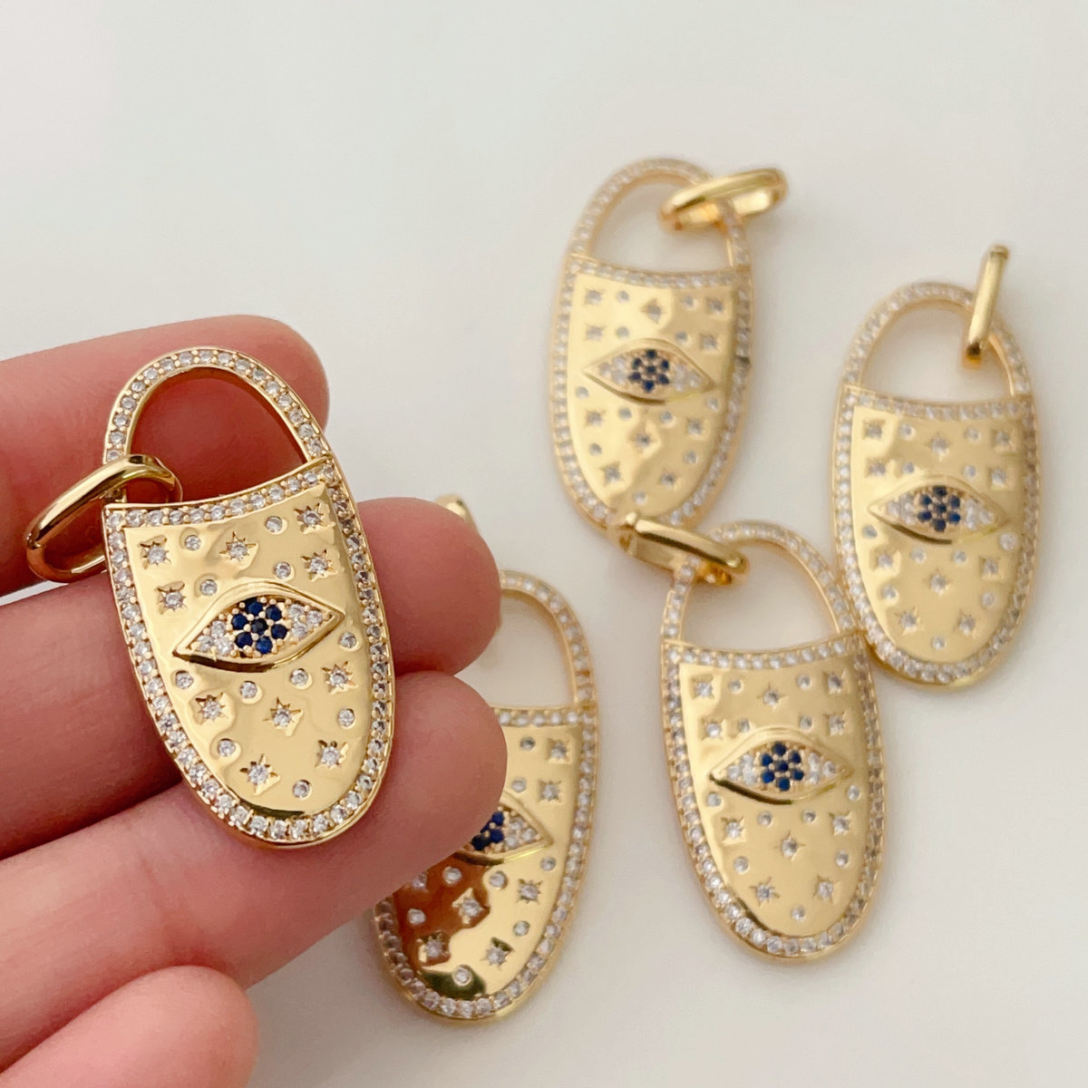 Pave eye long pendant