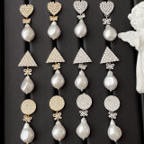 Pave earring with glass pearl pendant
