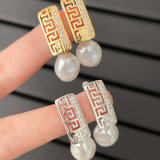 Pave earring with glass pearl pendant