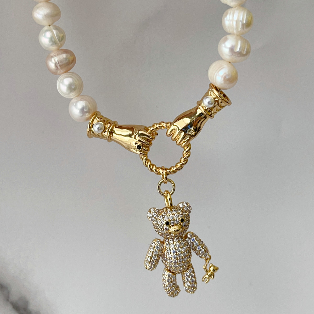 Fresh water pearl necklace with bear pendant