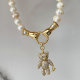 Fresh water pearl necklace with bear pendant