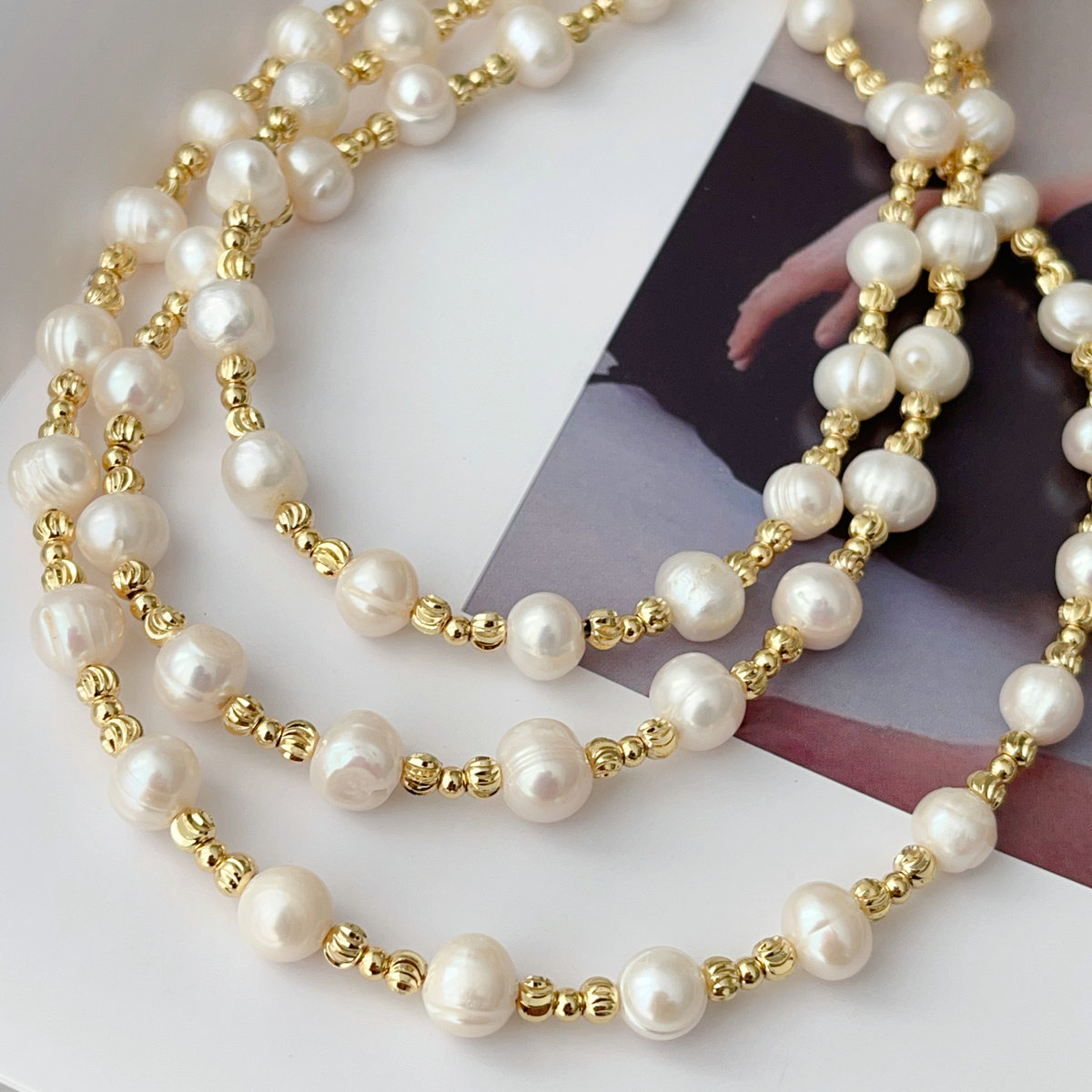 Fresh water pearl necklace with spacer bead