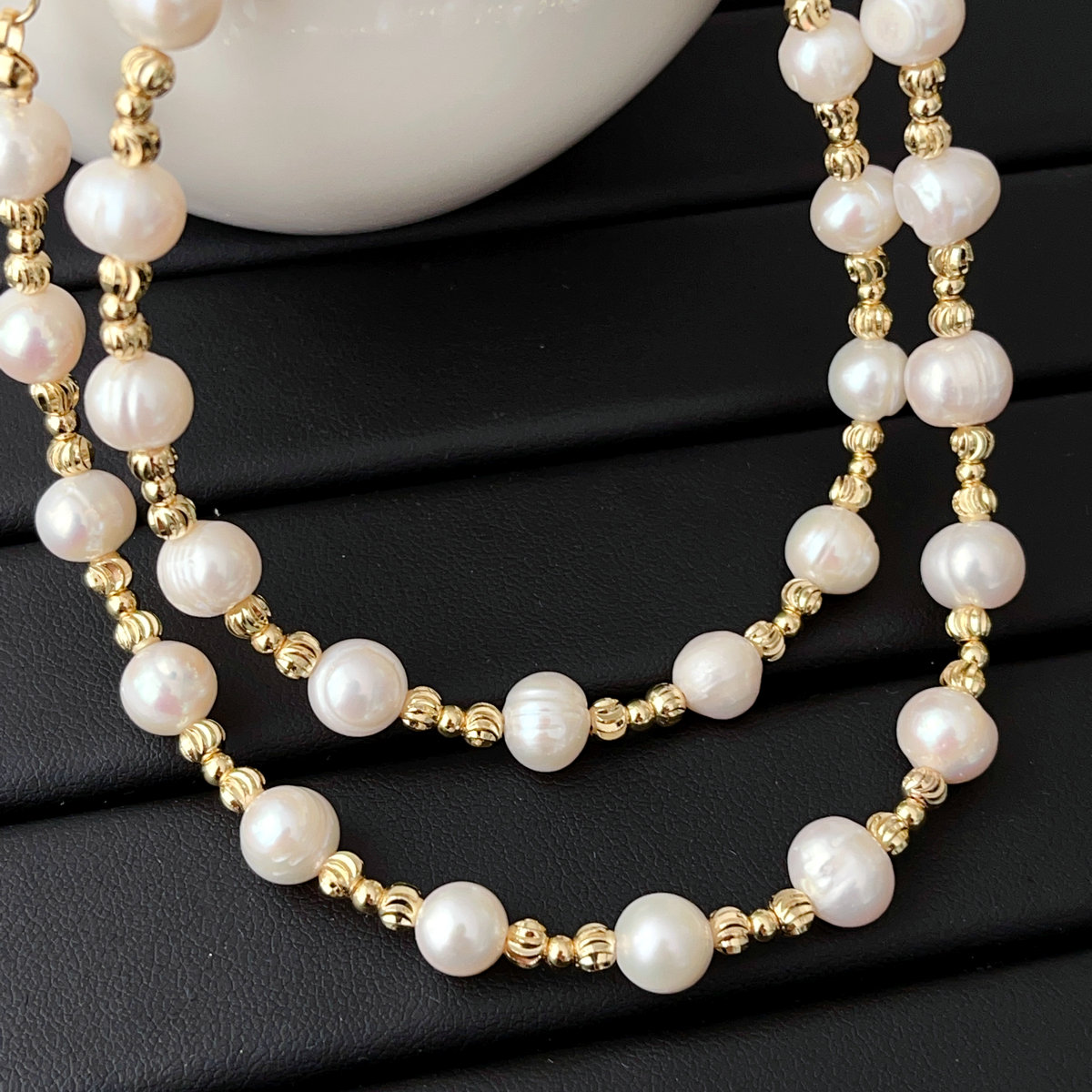Fresh water pearl necklace with spacer bead