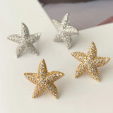 Pave star earrings