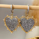 Black heart pendant earrings