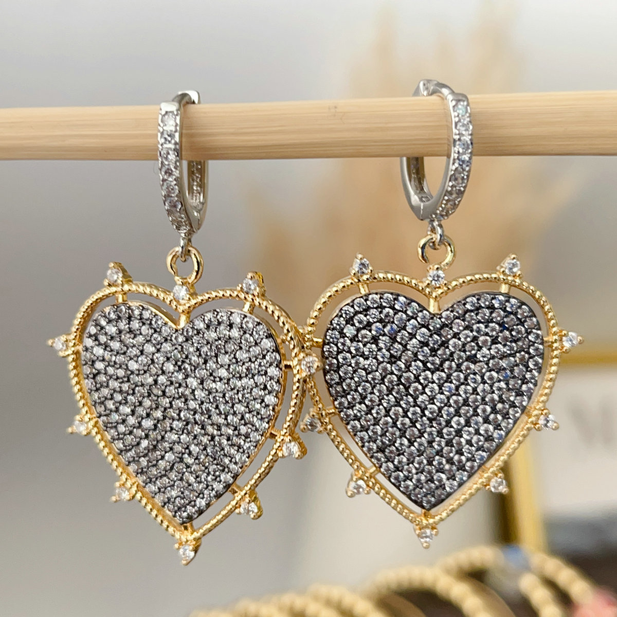 Black heart pendant earrings