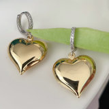 Big heart pendant with silver hoop earrings