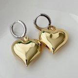 Big heart pendant with silver hoop earrings