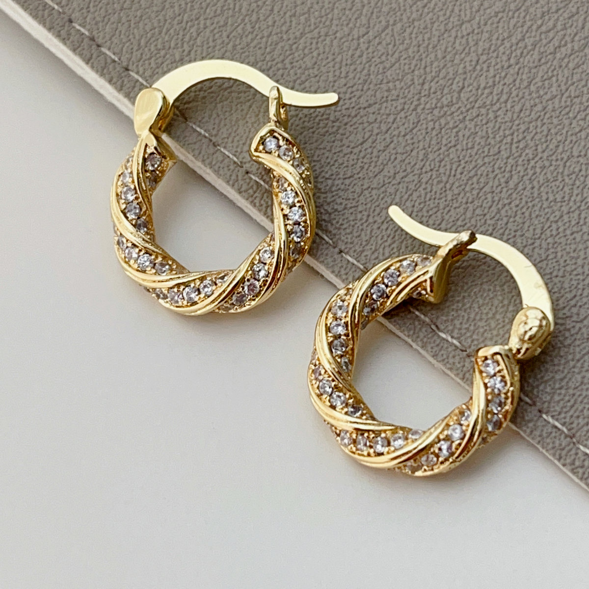 Pave twist hoop earrings