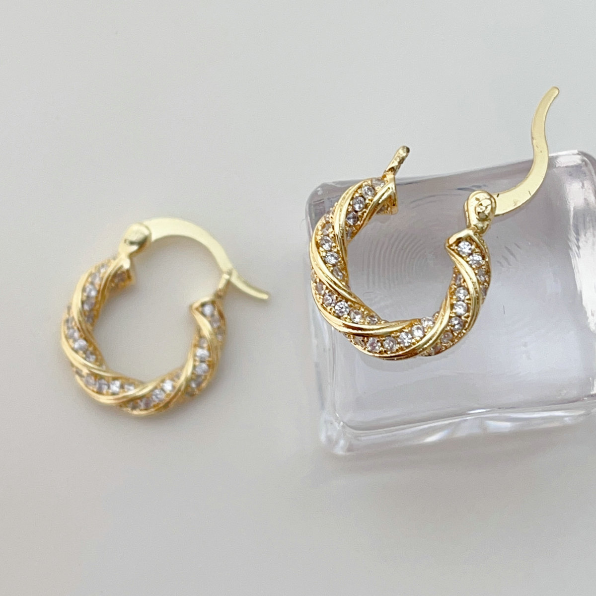 Pave twist hoop earrings