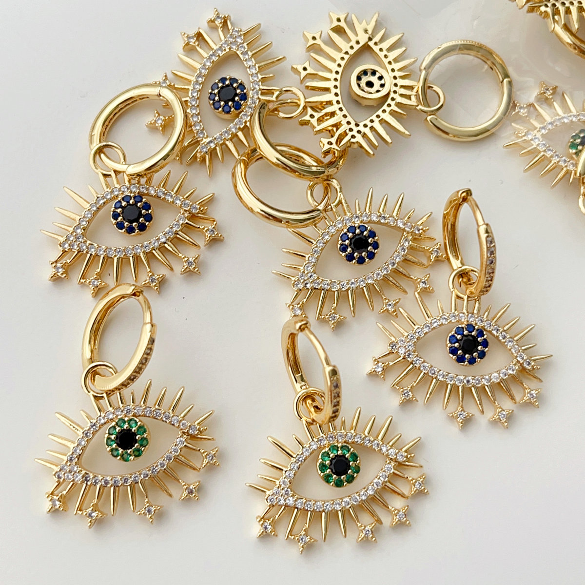 Pave zircon eye pendant earrings