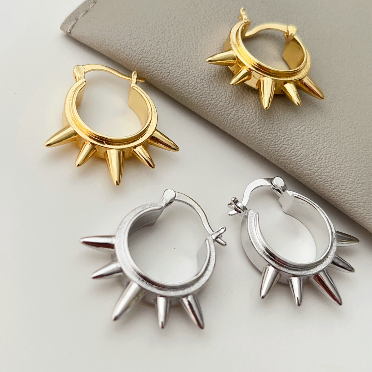Metal arrow hoop earrings