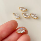 White zircon eye charm