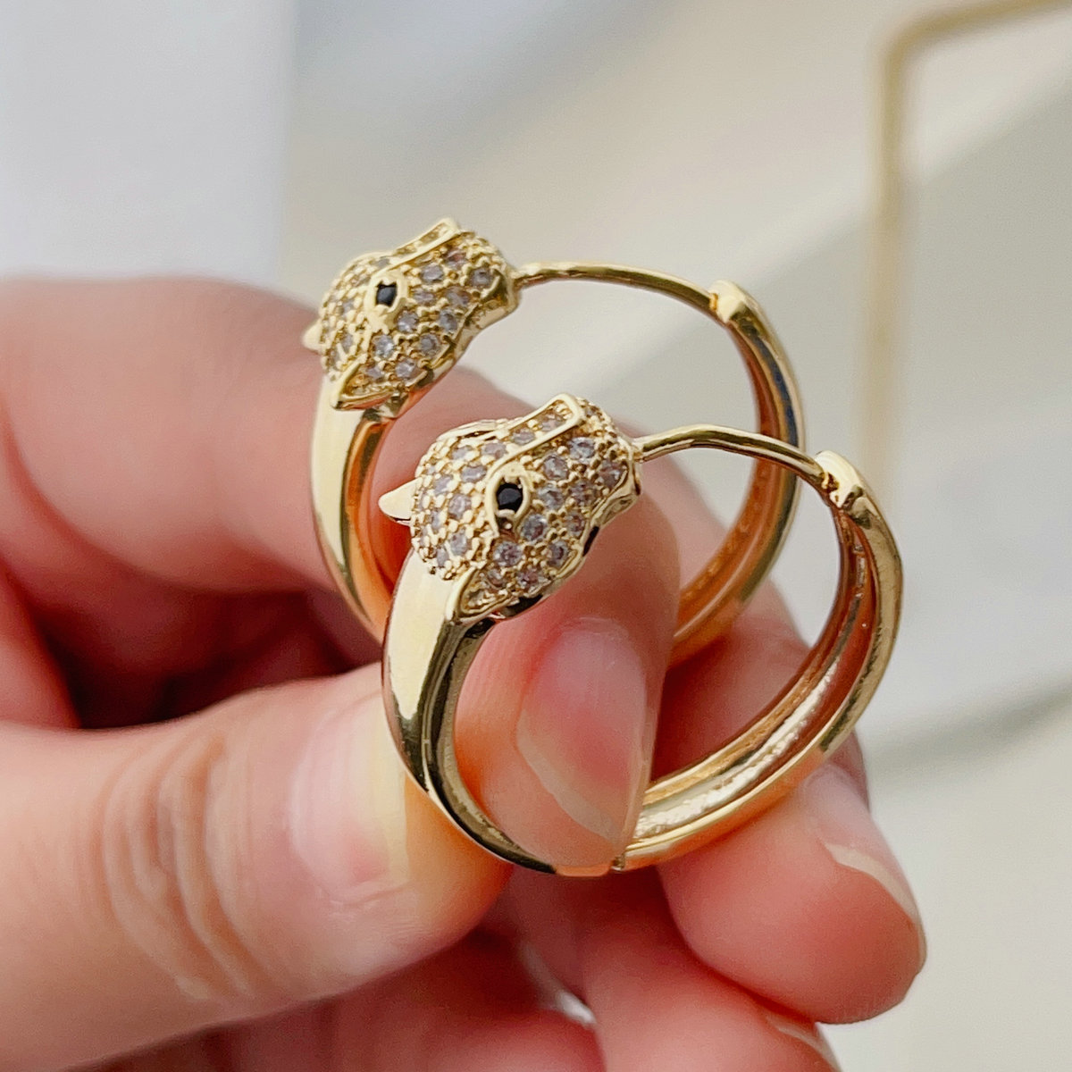 Pave lion hoop earrings