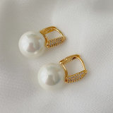 Round pearl drop earrings