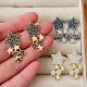 Pave star earrings
