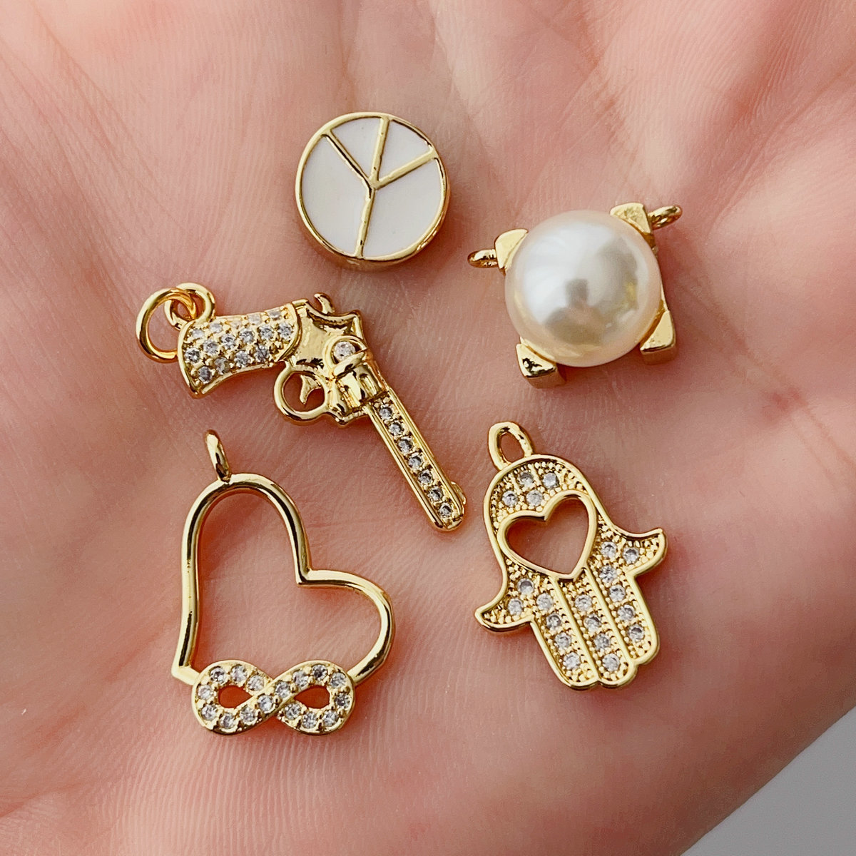 Pave gun , pearl... charm