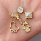 Pave gun , pearl... charm
