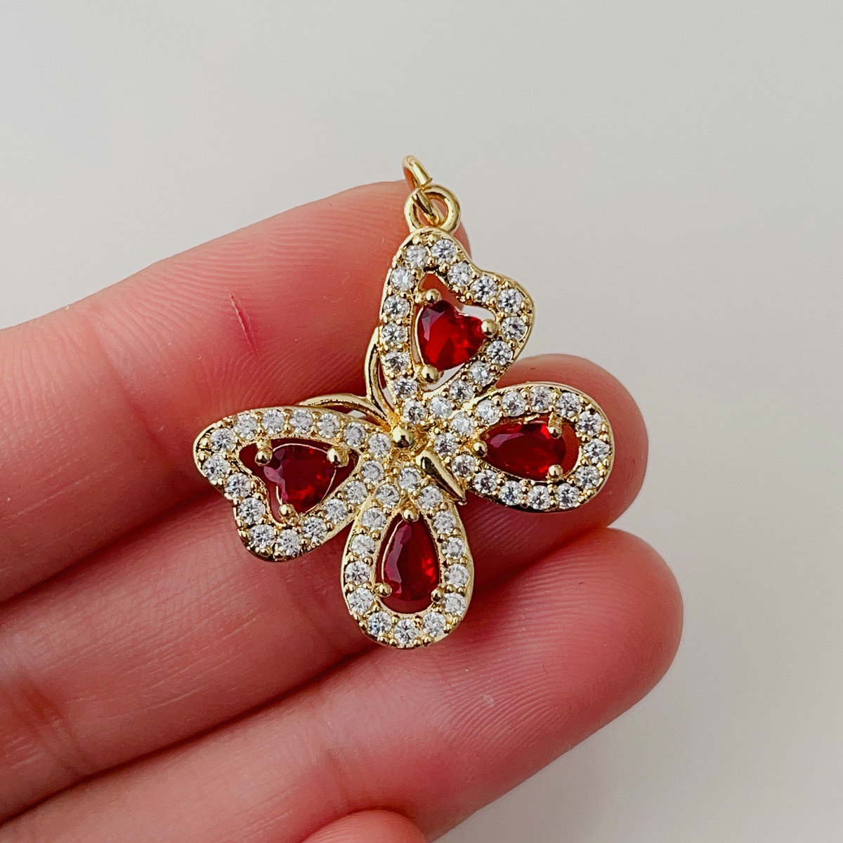 Pave red butterfly pendant