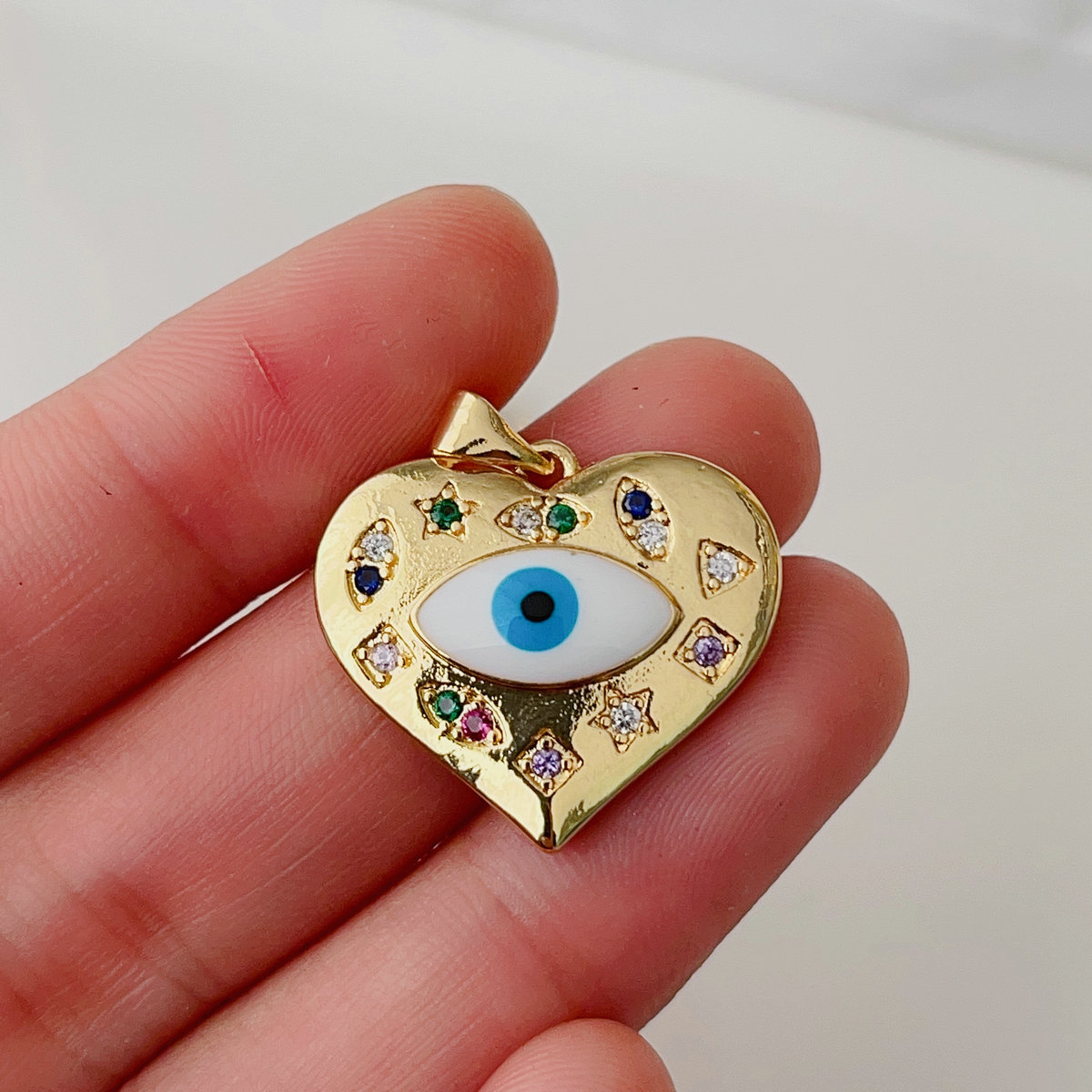 Enamel heart eye pendant