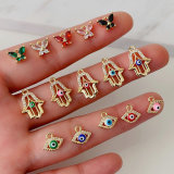 Pave small buttefly hand, eye charm
