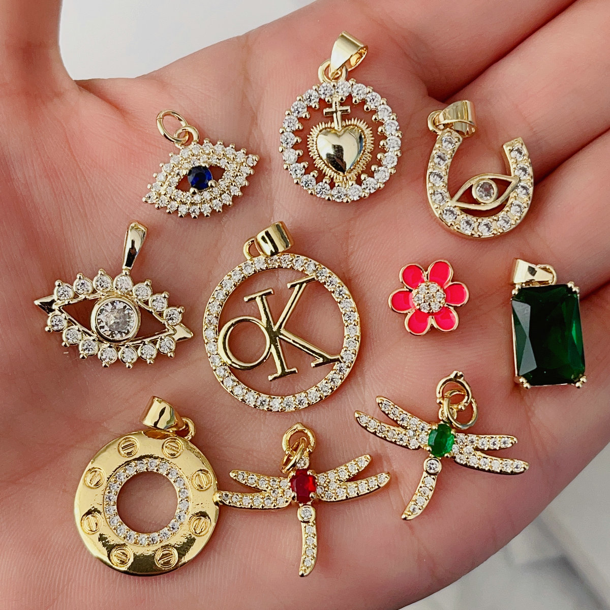 Pave eye , butterfly , heart ... charm