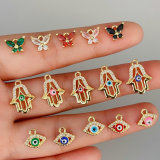 Pave small buttefly hand, eye charm