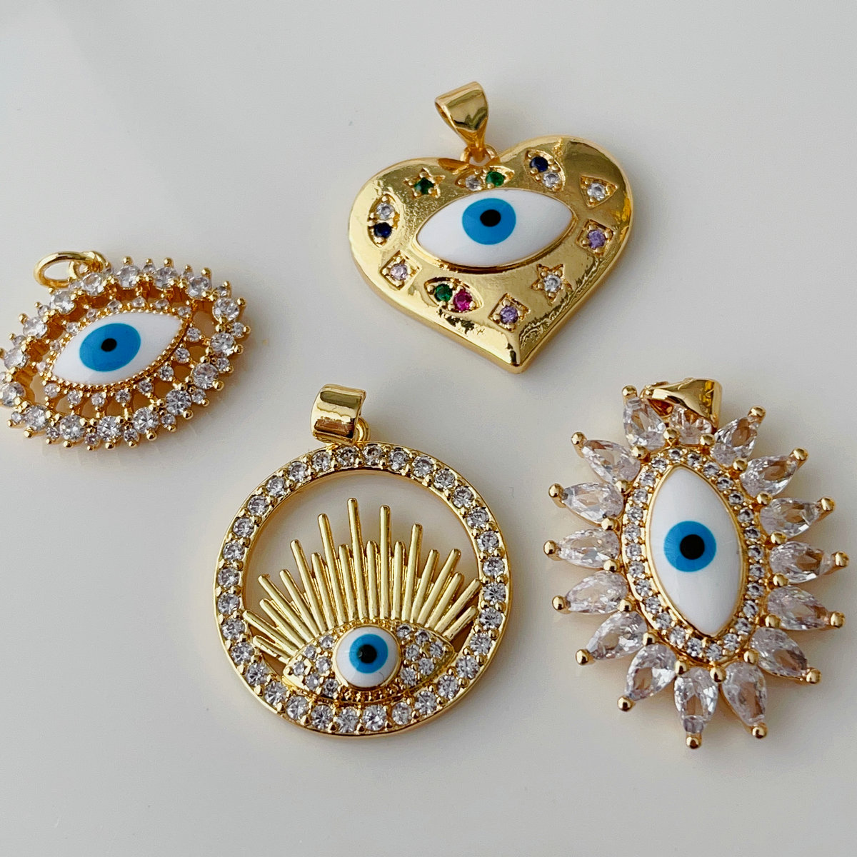 White enamel eye pendant