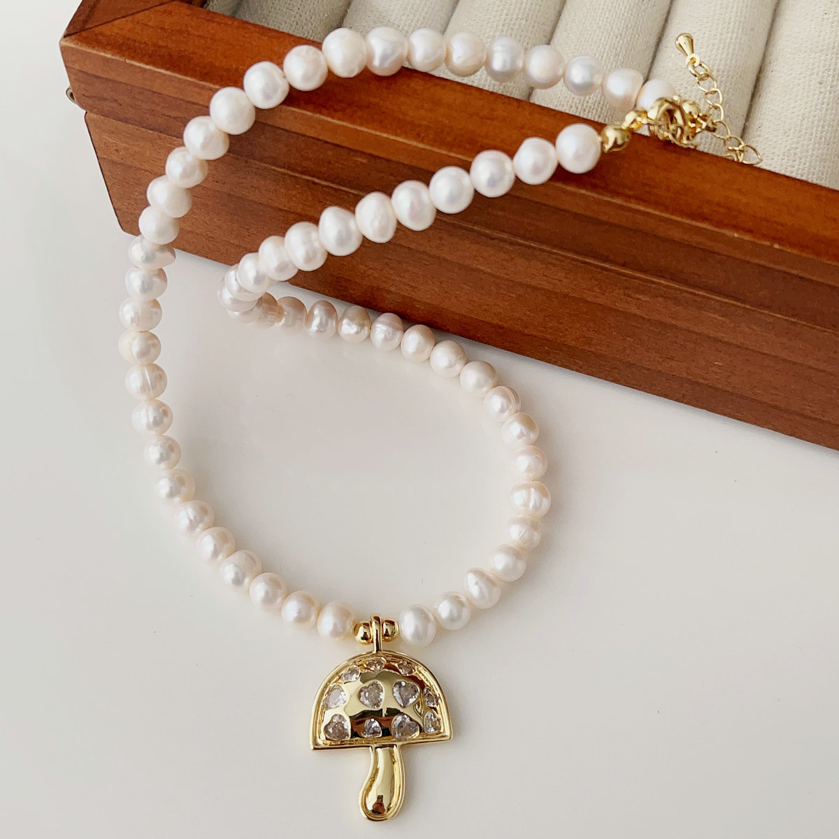 Pave mushroom pendant pearl necklace