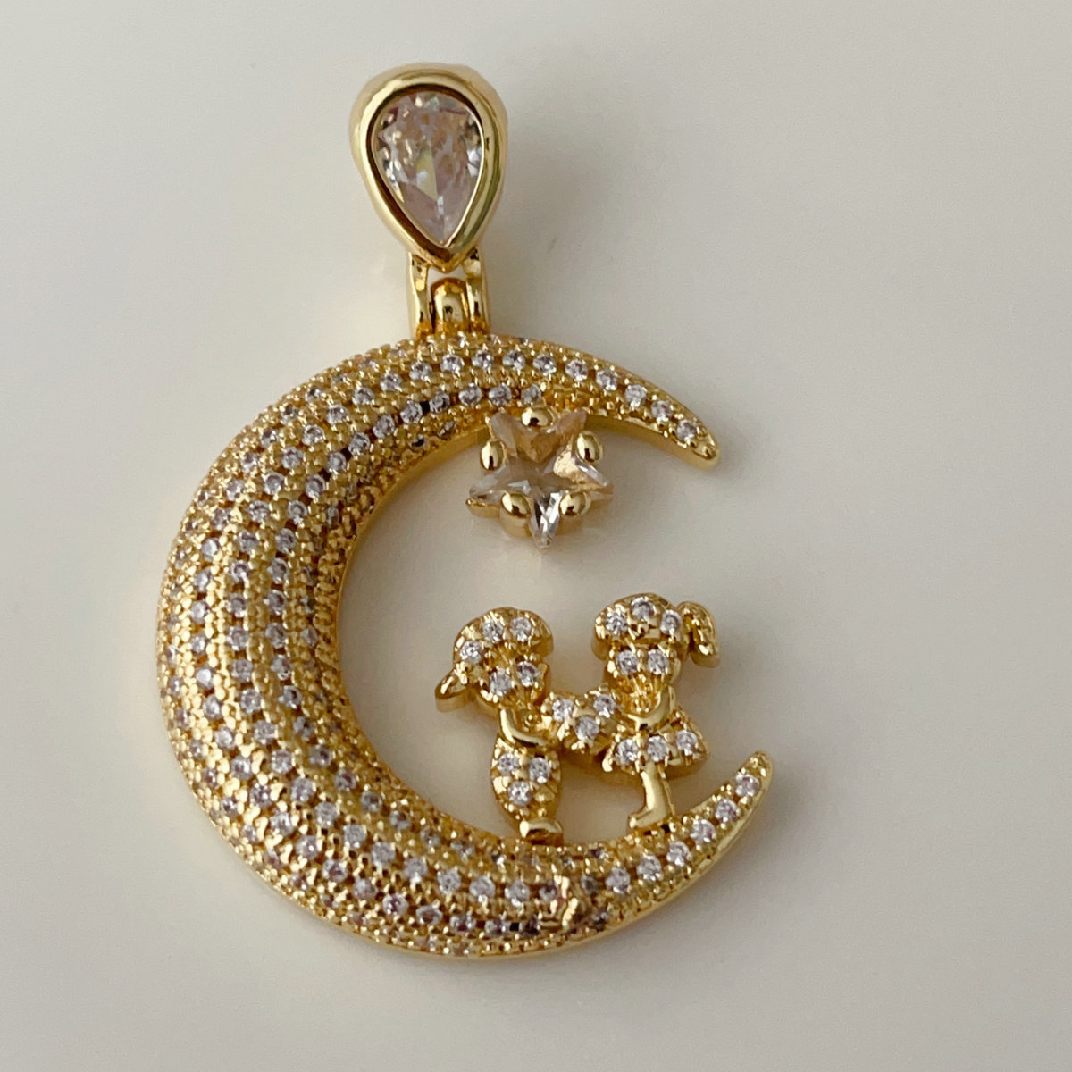 Pave moon pendant