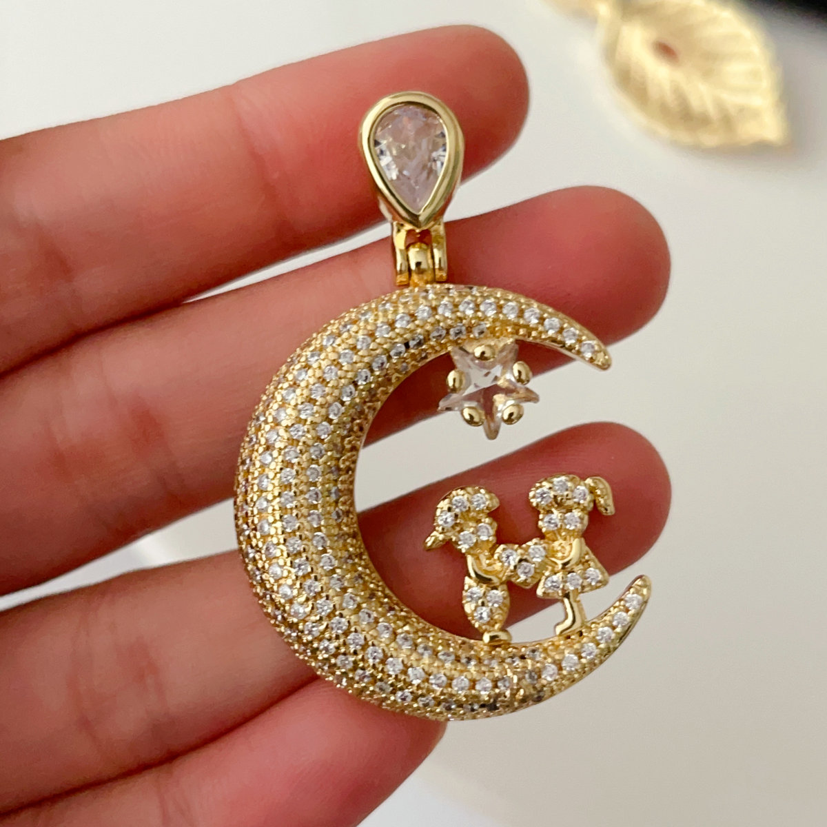 Pave moon pendant
