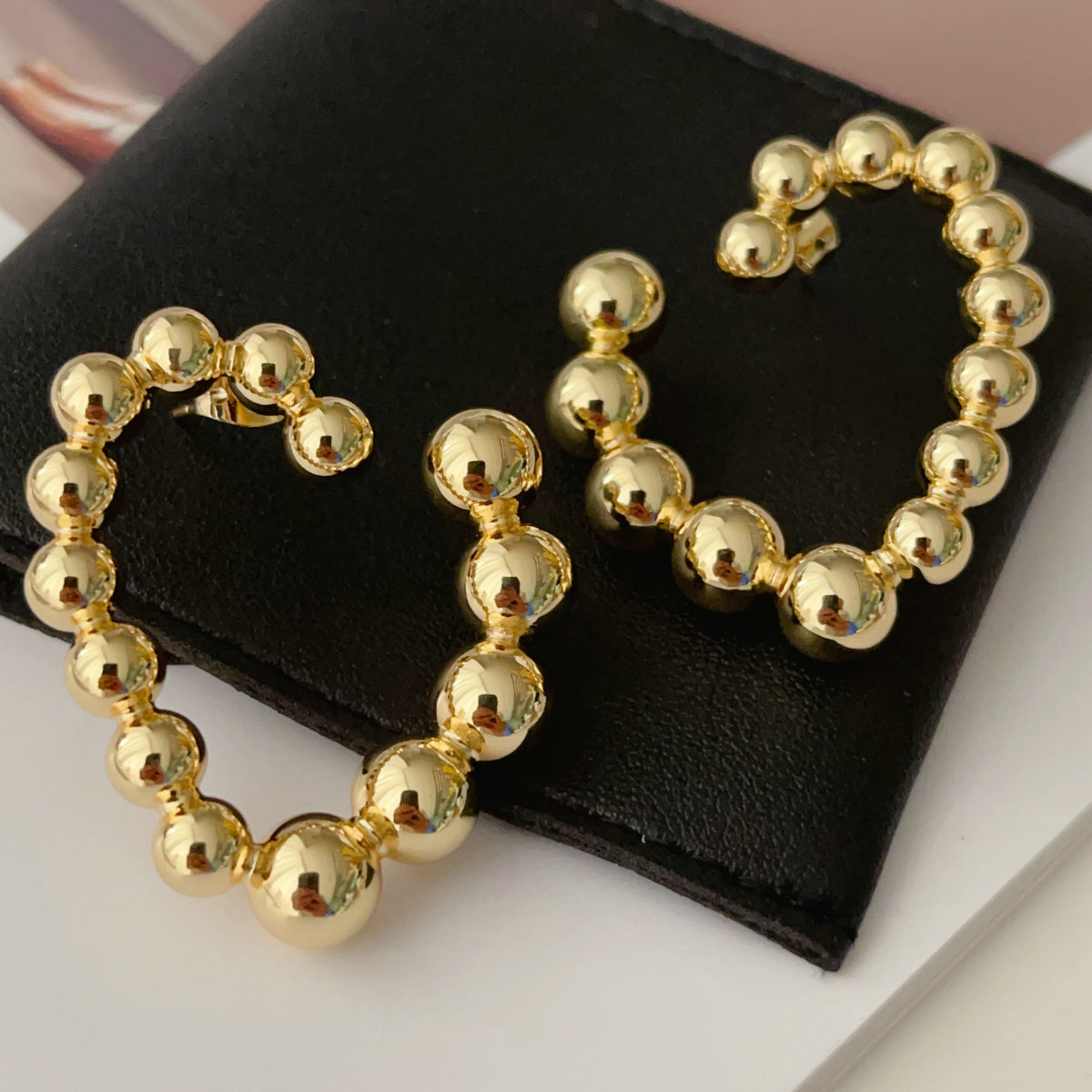Gold ball heart earrings