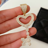 Pave key pendant