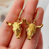 Gold plated horn pendant earrings