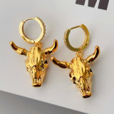 Gold plated horn pendant earrings