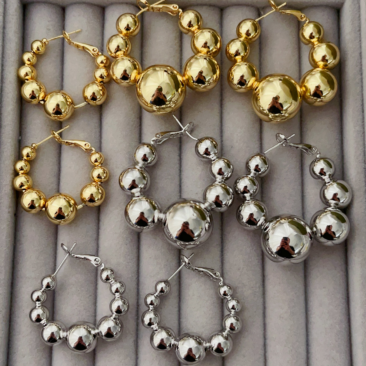 Ball hoop earrings