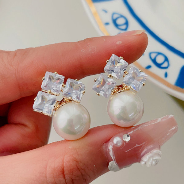 Pave heart pearl drop earrings