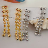 Gold bead ball long earrings