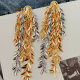 Long leaf chain tassel earrings