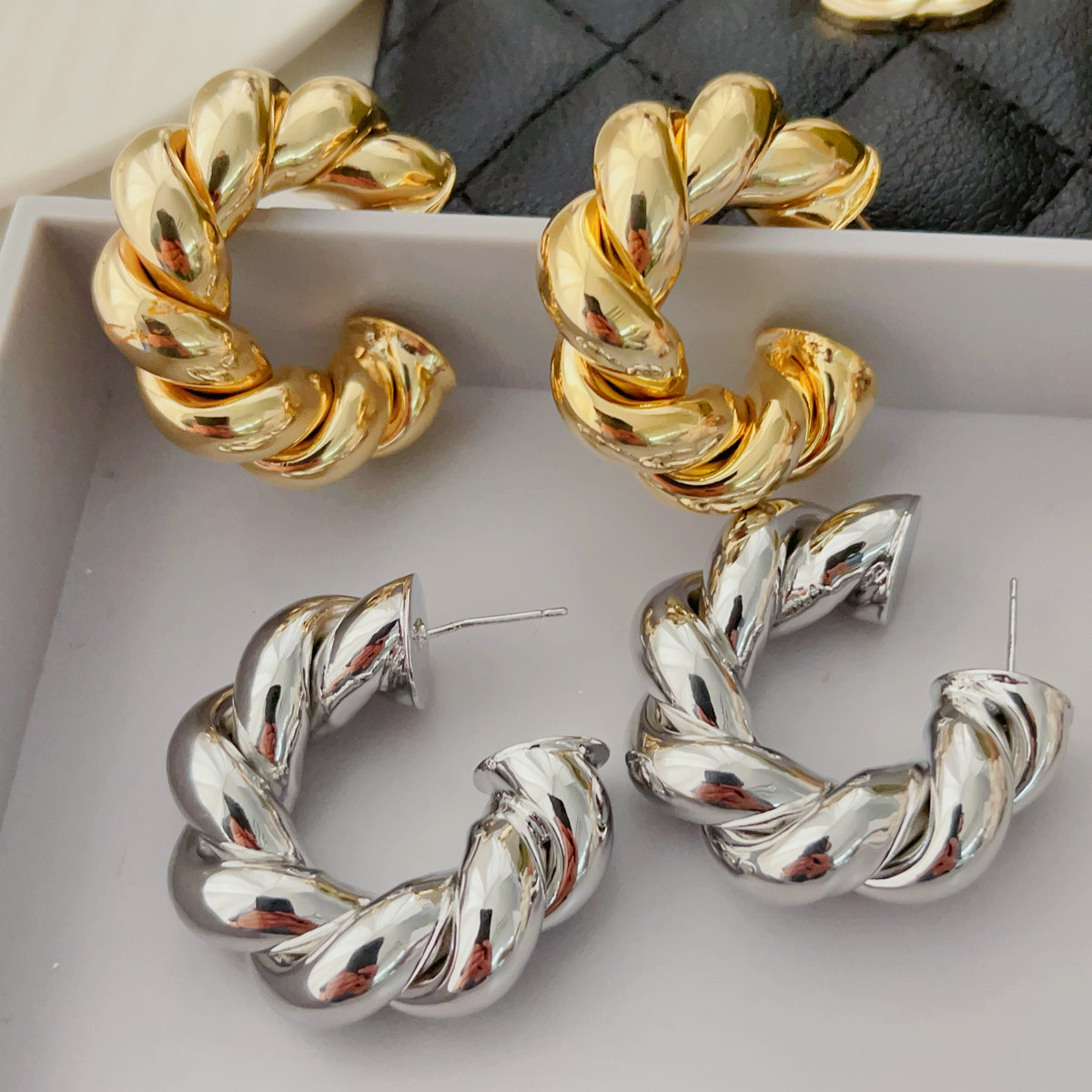Big chunky twist hoop earrings