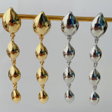 Gold ball long earrings