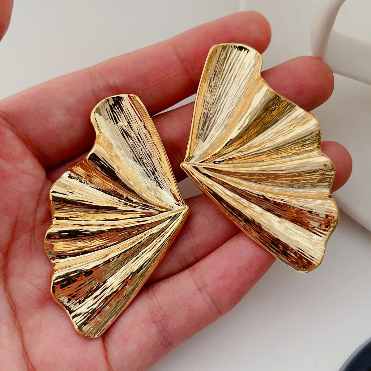Gold fan earrings