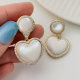 Pave heart earrings