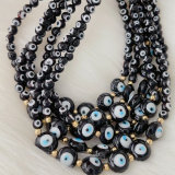 Black evil eye glass necklace