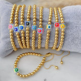 Gold bead with glass eye bracelet