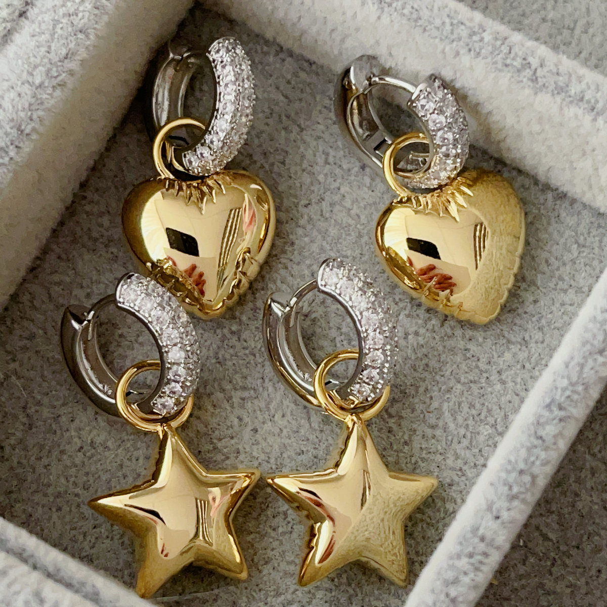 Heat , star pendant drop earrings
