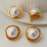 Big gold twist earrings