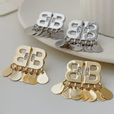 B tassel earrings